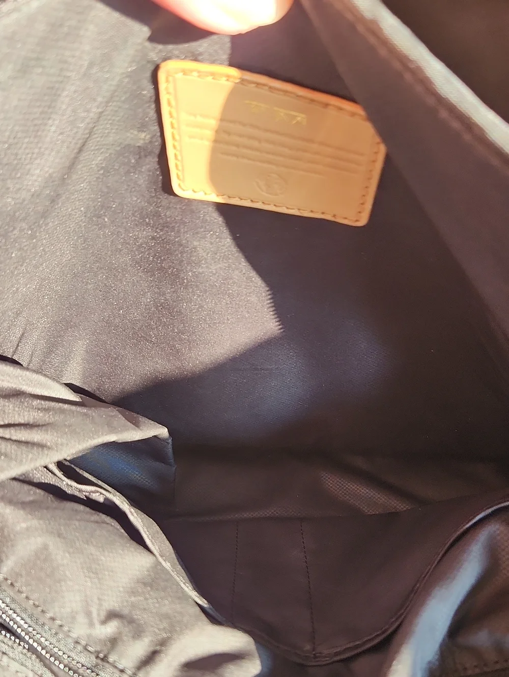 Tumi Voyager Harper Black Backpack with Tan Leather Accents